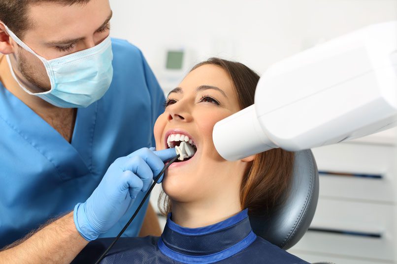 Female Patient Getting Root Canal Treatment in Oakville, ON