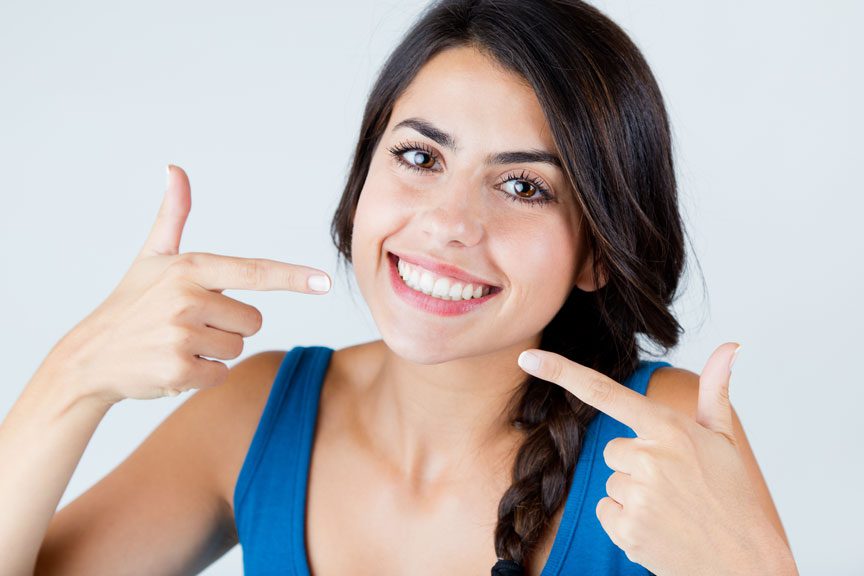Woman Smiling After Teeth Whitening In Oakville, ON