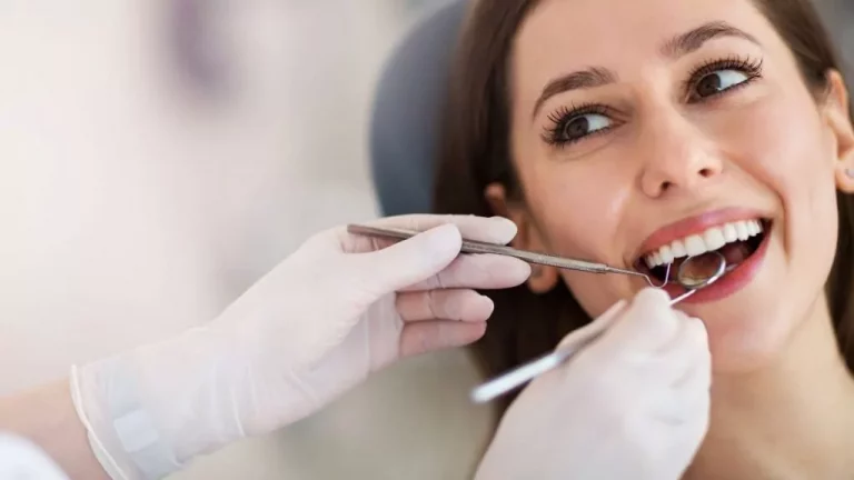 A Woman sitting for Tooth Fillings treatment