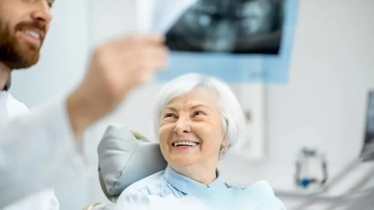 An Elderly Woman Smiling In Dental Clinic