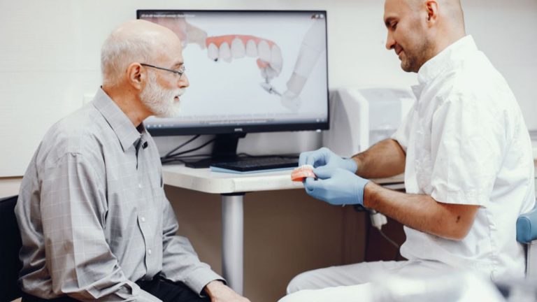 Tips for Choosing Between a Dental Bridge and an Implant